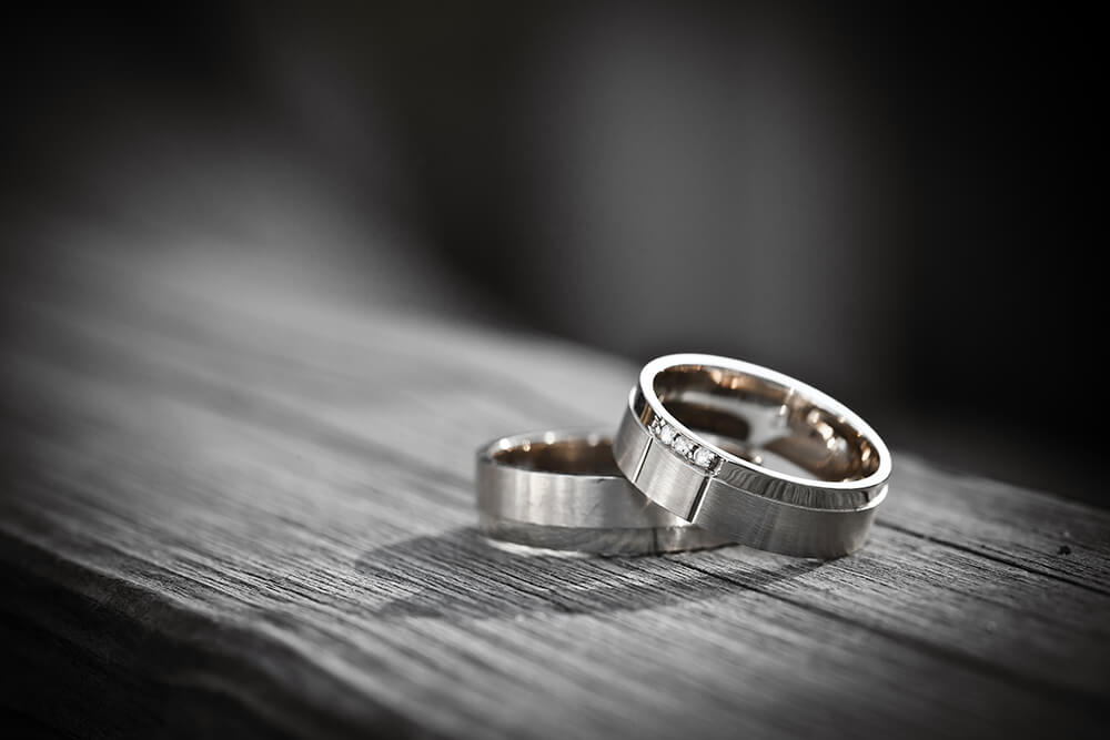 Wedding rings on bench